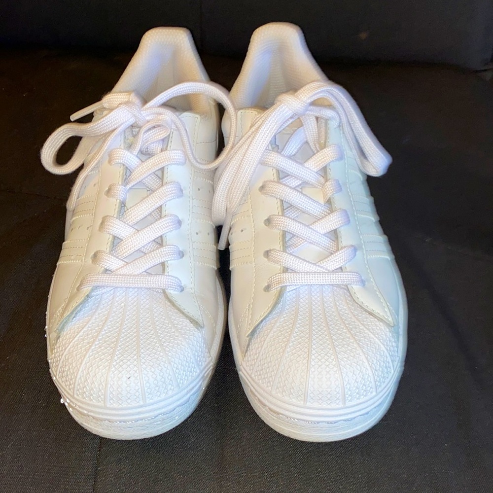 Brand new crisp, white Adidas sneakers